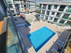 شقة دوبليكس خمس غرف وصالتين في وسط منطقة بيلكدوزو للايجار السنوي